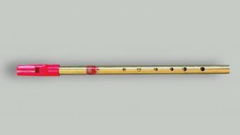 Generation brass tin whistle full front view