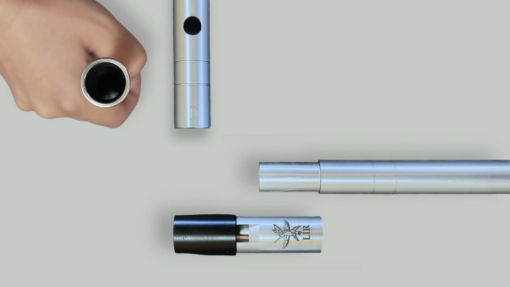 Close-up views of the Lir PRO tin whistle bottom end and tuning slide