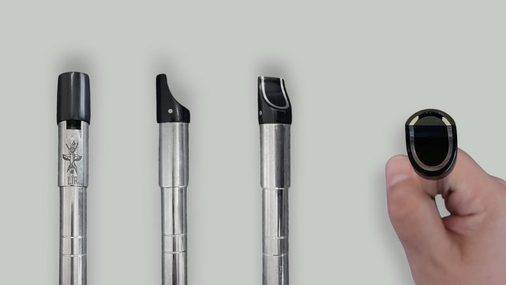 Close-ups of the Lir silver tin whistle mouthpiece (head) and blowing windway