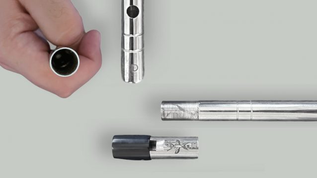 Close-up views of the Lir silver tin whistle bottom end and tuning slide