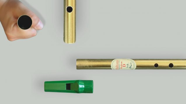 Close-up views of the Waltons mellow tin whistle bottom end and tuning slide
