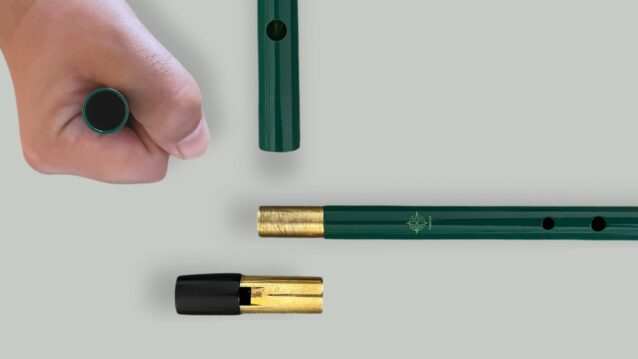 Close-up views of the Compass tin whistle bottom end and tuning slide